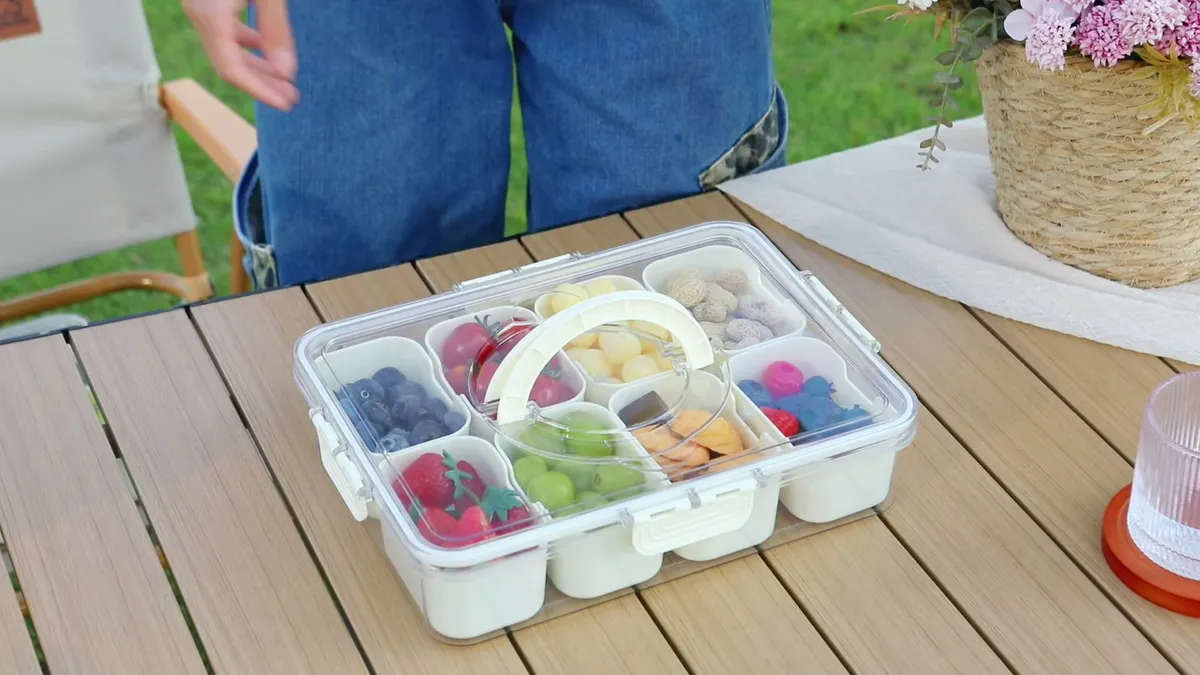 Snackle Box ready on a wooden table in the garden